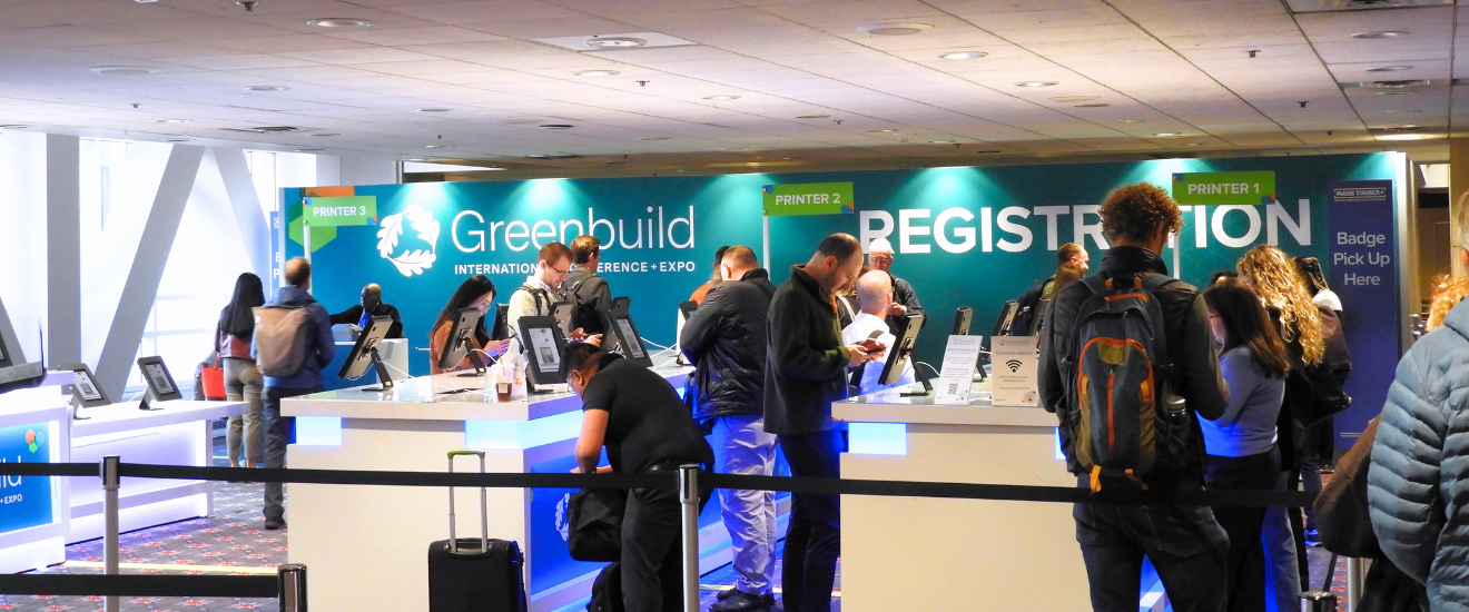 Event attendees using the digital kiosks for self check in and registration during the Greenbuild International Conference and Expo at the Pennsylvania Convention Center.