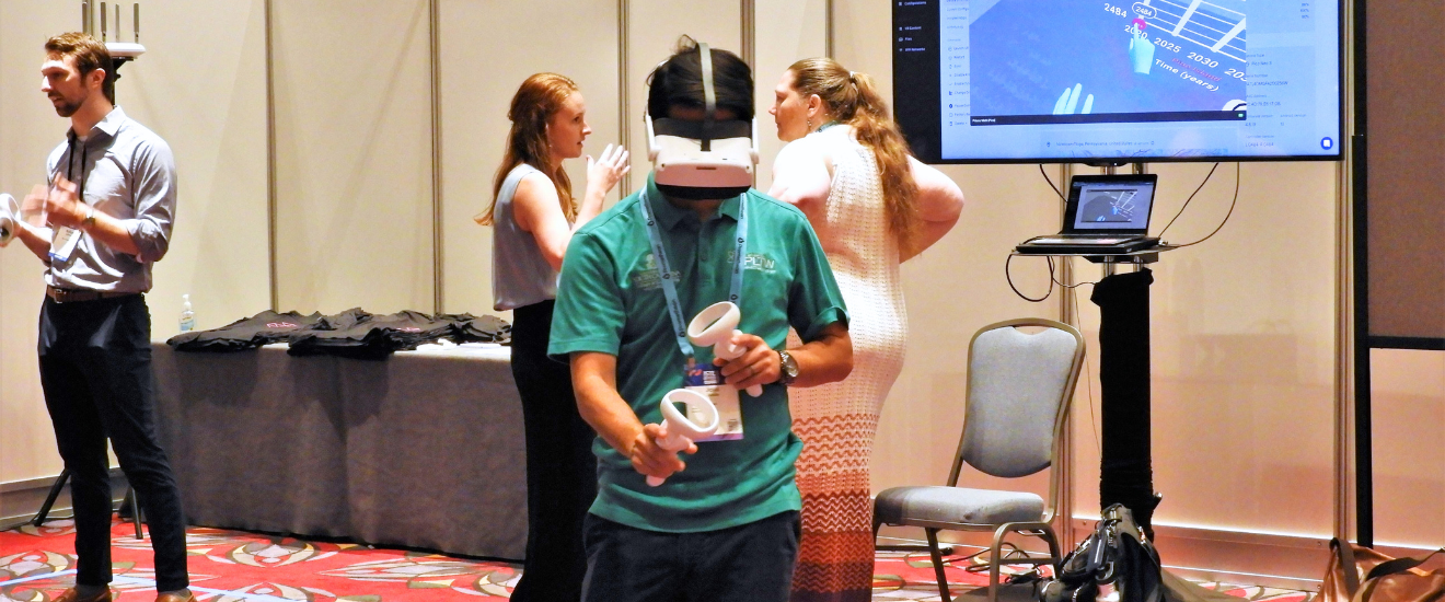 An attendee at ISTE Live 2023 at the Pennsylvania Convention Center uses virtual reality technology during a workshop.